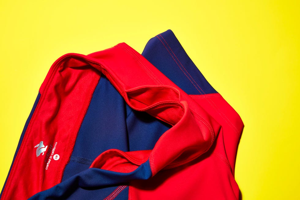 Red, Clothing, Electric blue, Cobalt blue, Yellow, Outerwear, Sportswear, Sleeve, Textile, Jersey, 