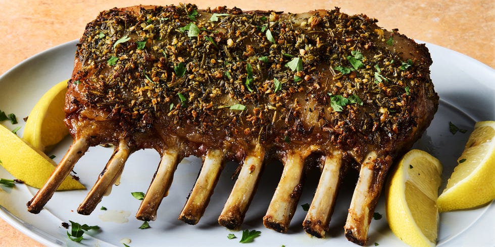 roasted rack of lamb served with lemon wedges