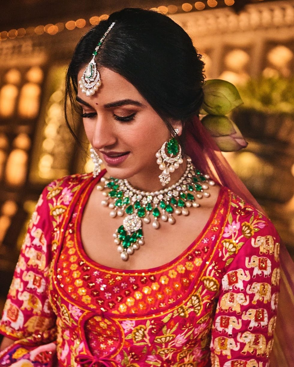 a woman wearing a colorful dress