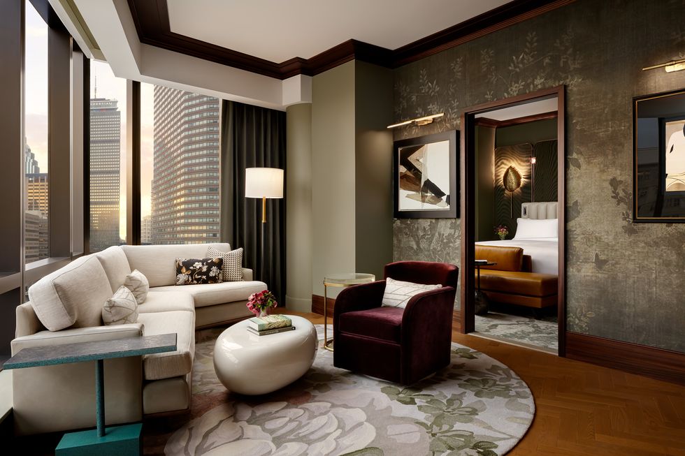 living room of a suite raffles hotel boston