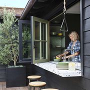 the outdoorsy type southern california cottage, homeowner raili clasen indoor outdoor bar height counter
