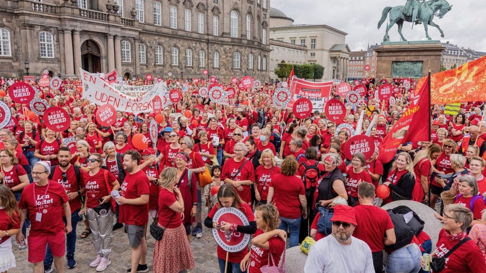 a large group of people marching