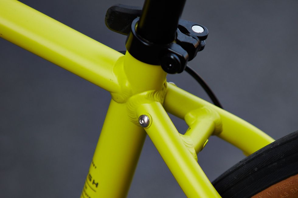 Bicycle part, Bicycle wheel, Bicycle, Bicycle tire, Yellow, Bicycle frame, Vehicle, Spoke, Rim, Wheel, 