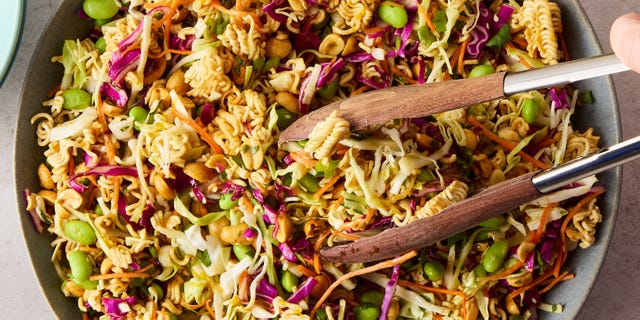 ramen noodle salad with edamame, purple cabbage, and peanuts