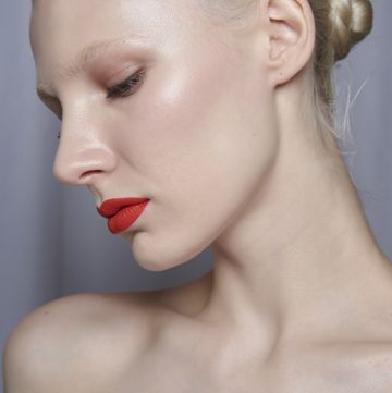 a woman with a red lipstick
