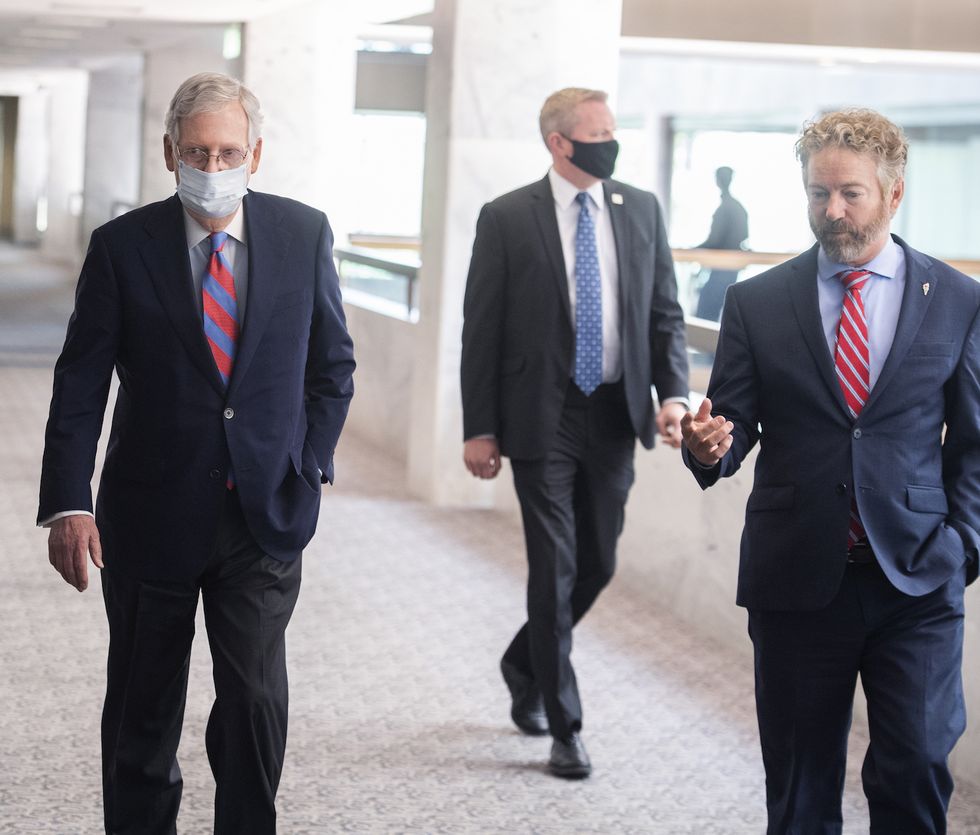 united states   may 12 senate majority leader mitch mcconnell, r ky, left, and sen rand paul, r ky, arrive for the senate republican policy luncheon in hart building on tuesday, may 12, 2020 photo by tom williamscq roll call, inc via getty images