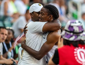 randolph ross hugs his father and coach, duane ross after the olympic trials in 2021