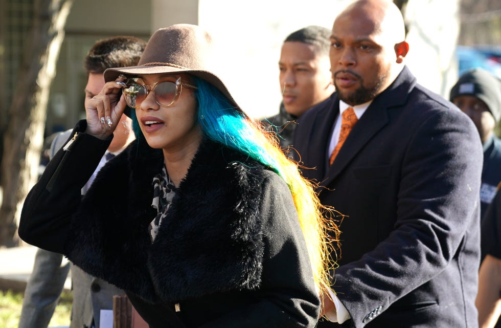 Cardi B Shows Up to Court in All-White and Shades for Alleged Strip Club  Brawl