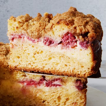 coffee cake with layered of raspberry and cream cheese with a crumble topping