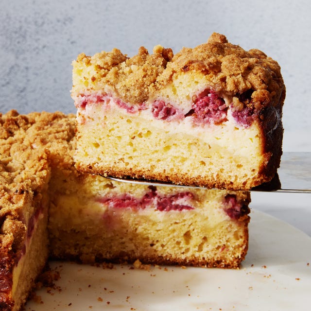 coffee cake with layered of raspberry and cream cheese with a crumble topping