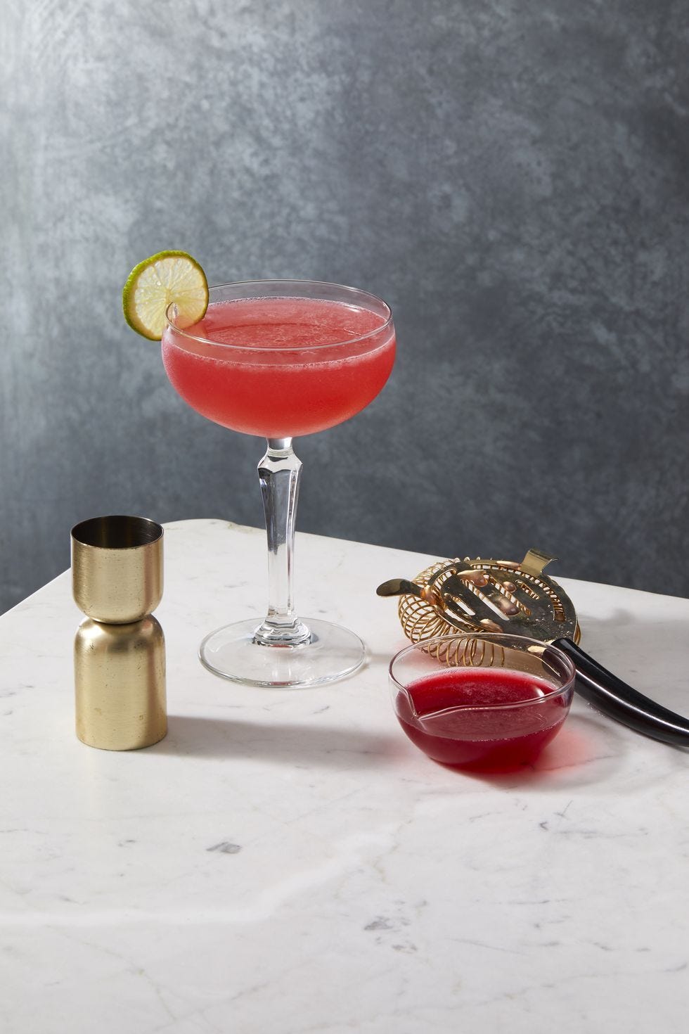 raspberry daiquiri in a coup glass