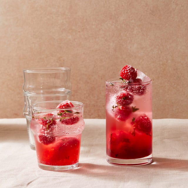 pink cocktails sparkling raspberry hibiscus mocktails pink cocktails 2 glasses of sparkling raspberry hibiscus mocktails with raspberry thyme ice cubes