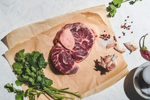 raw beef steak osso bucco with spices