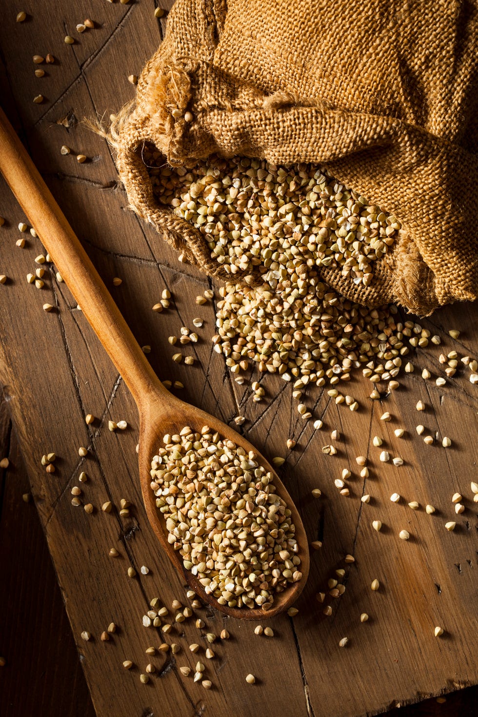 raw dry organic buckwheat in a spoon,romania