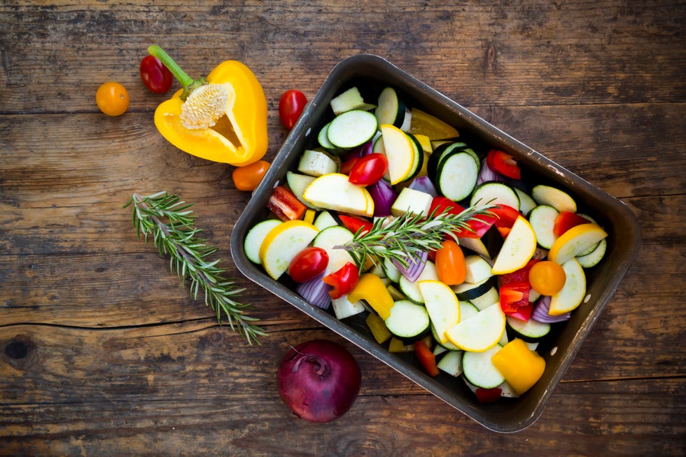 Raw Mediterranean oven vegetables on roasting tray