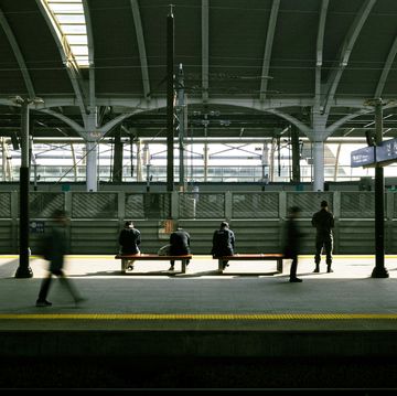 people waiting at a train station