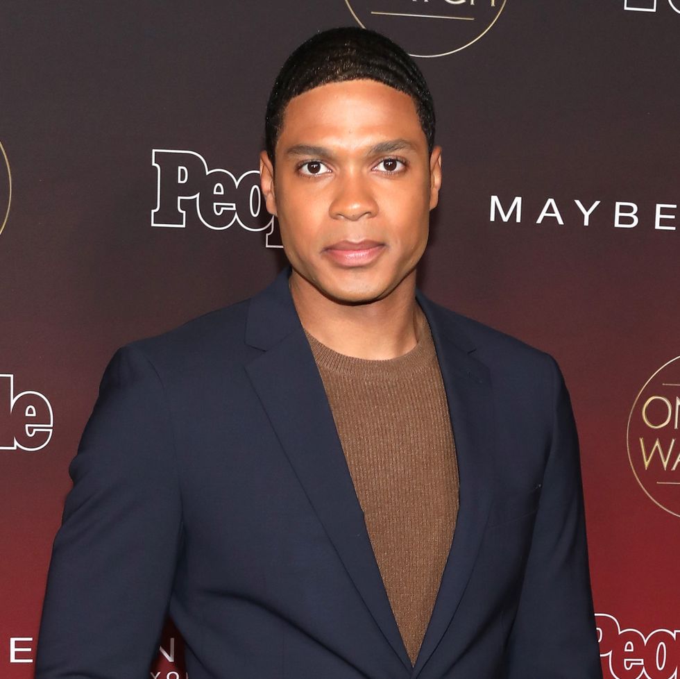 ray fisher, serous expression, suit, hand in pocket