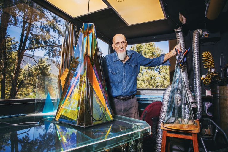 ray howlett with a work in progress light sculpture in his studio north of los angeles