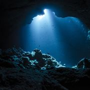 rays of sunlight into the underwater cave