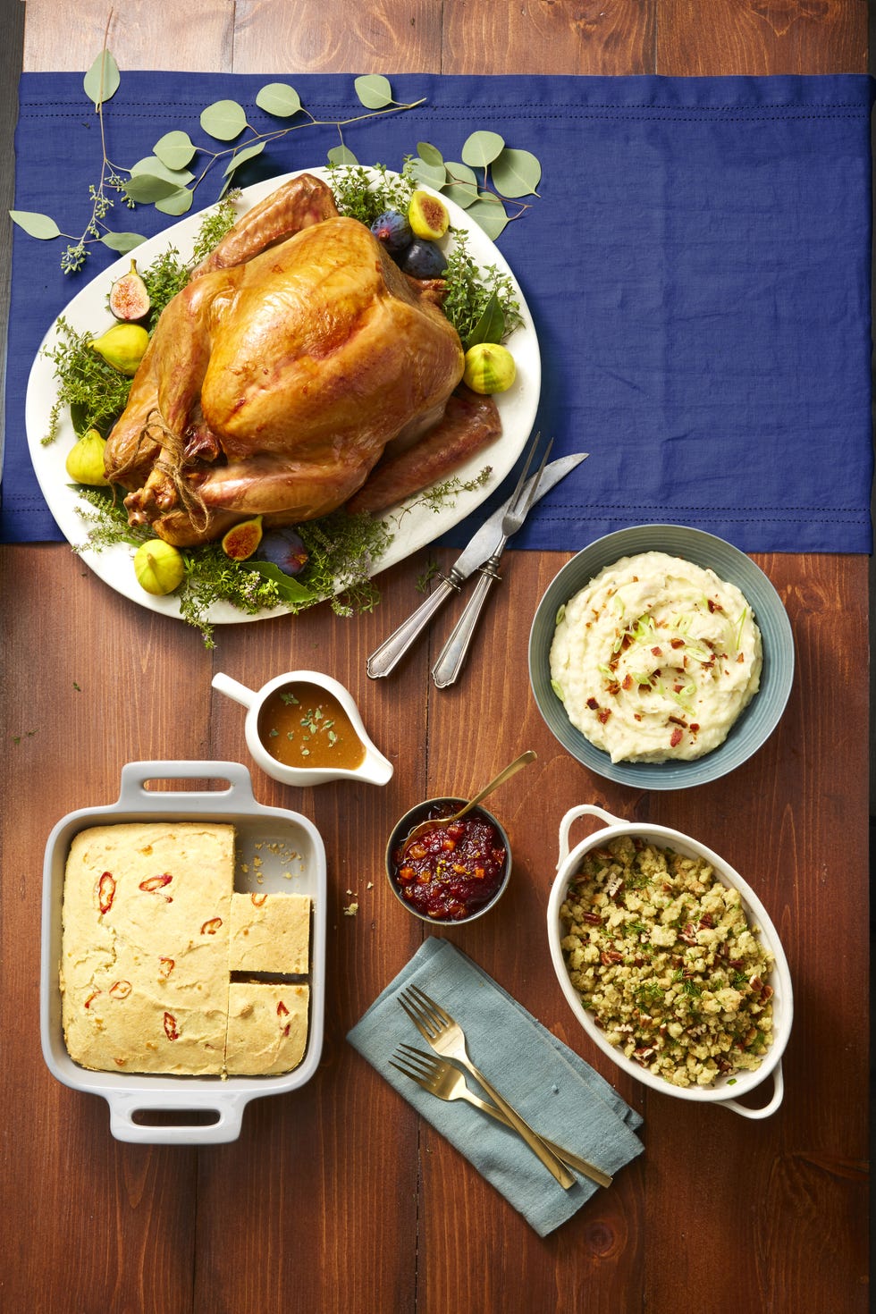 roasted thanksgiving  turkey on a bed of green herbs