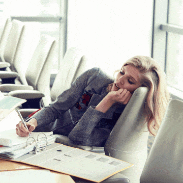 woman tired at desk
