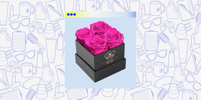 floral arrangement in a black box featuring bright pink roses