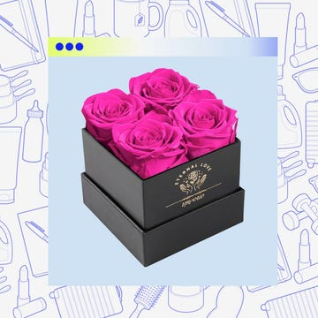 floral arrangement in a black box featuring bright pink roses floral arrangement in a black box featuring bright pink roses