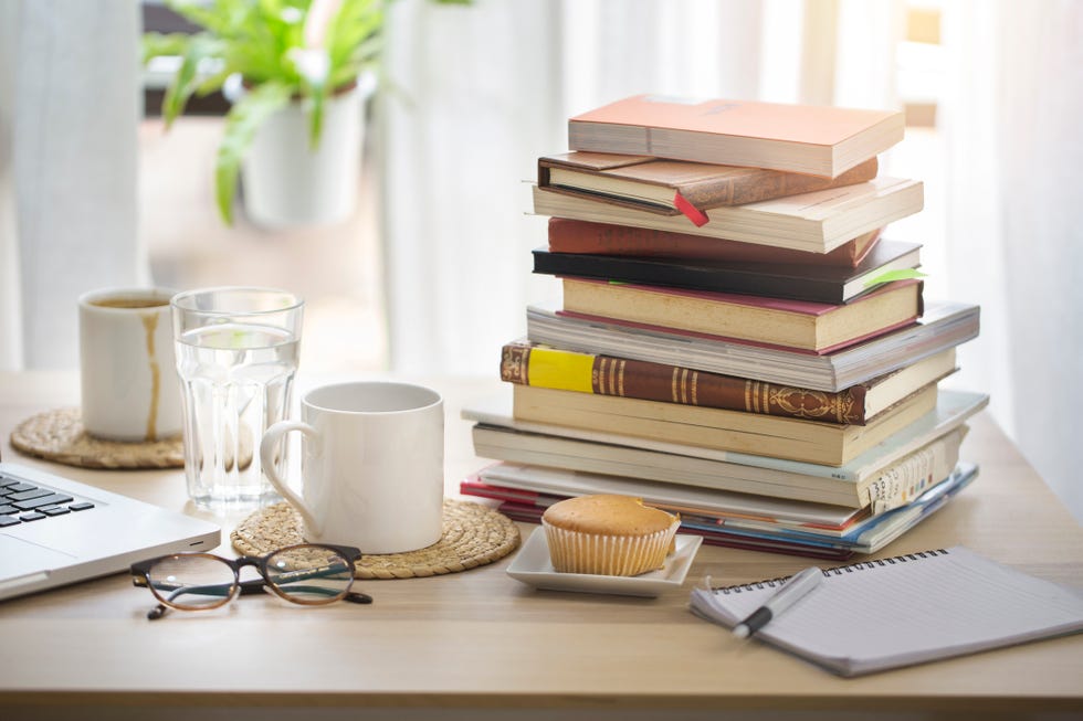pile of books on table