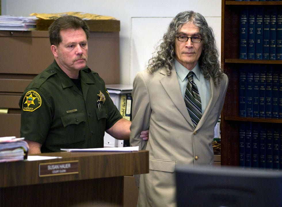 serial murder suspect rodney alcala enters the courtroom before the start of final arguments in the death penalty trial in santa ana he has long grey curly hair