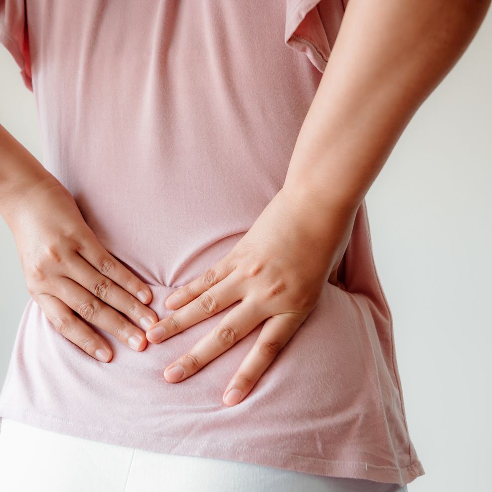 Lower Back Pain Causes in Females: Symptoms, Treatments, More