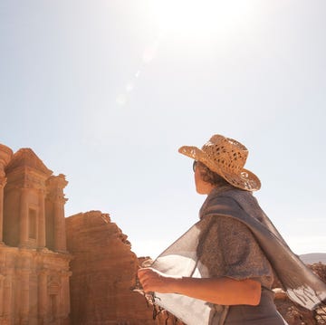 woman traveller at ruin. woman traveller at ruin ed deir, the monasteryjordan,petra
