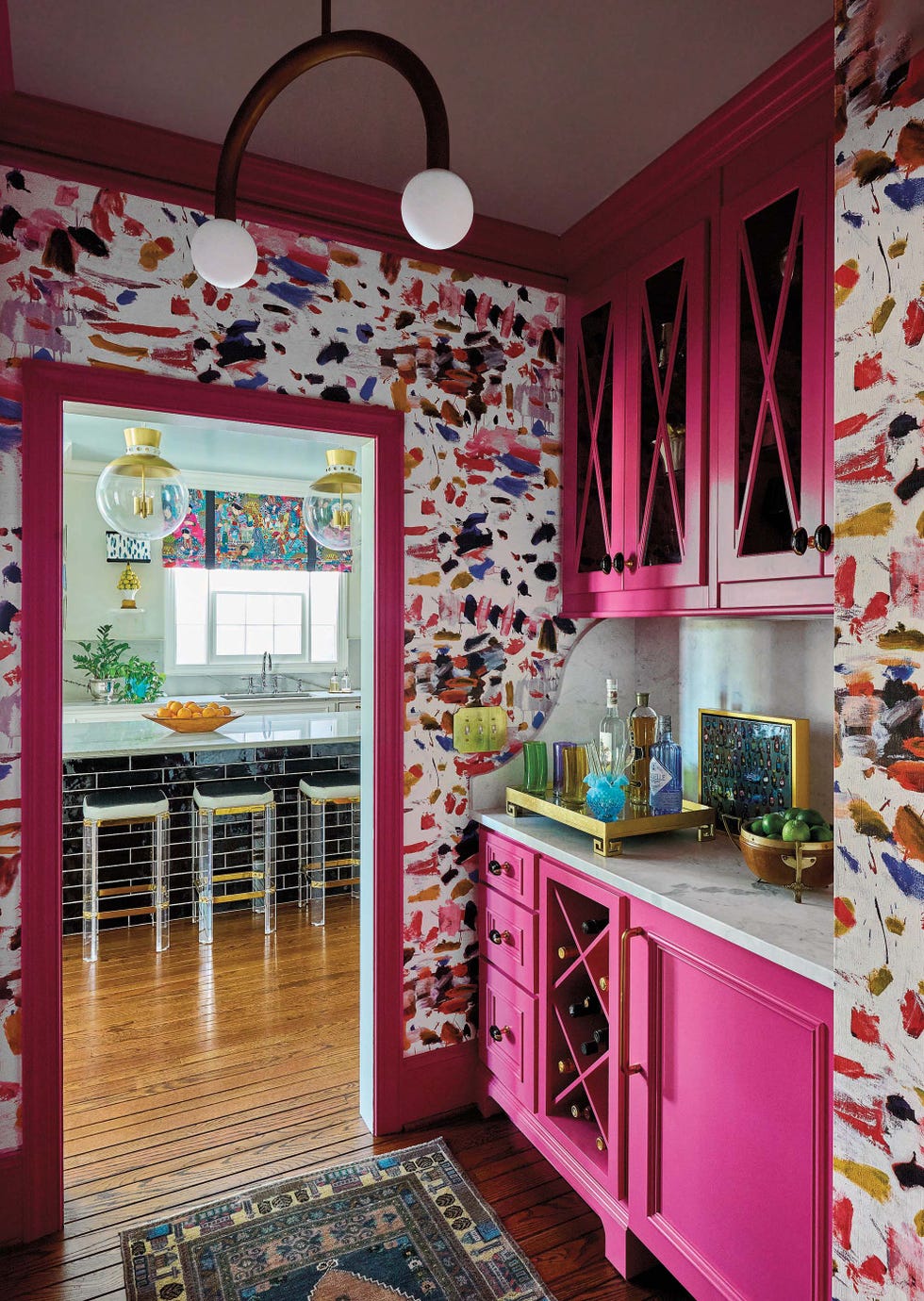 Kitchen with pink cabinets