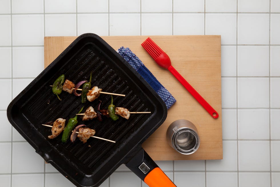Receta de pollo a la brasa con pimientos y cebolla