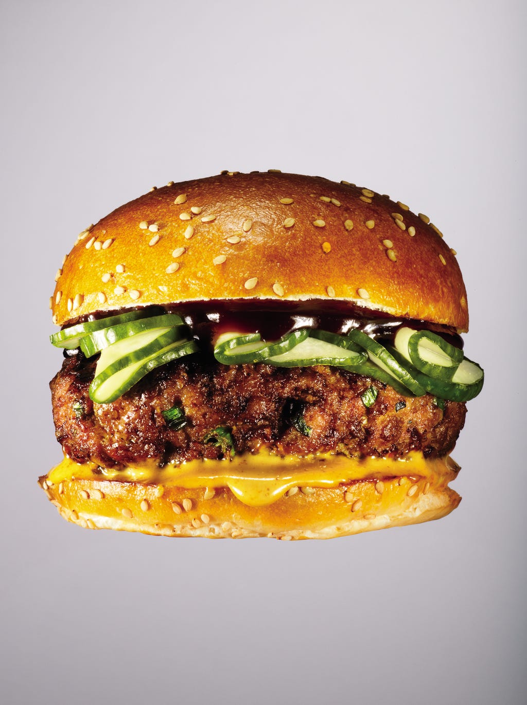 asian-pork-burger-1456706875.jpg?crop=1xw:0.373xh;center,top&resize=1200:*