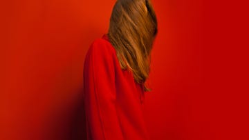 woman in red reclaim your rage concept