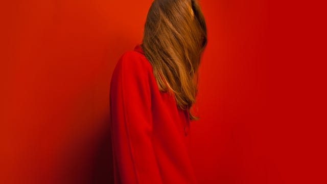 woman in red reclaim your rage concept
