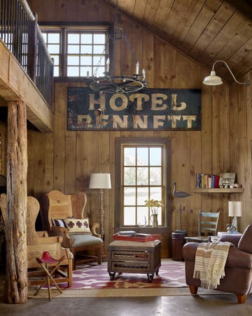 living room with reclaimed wood on walls