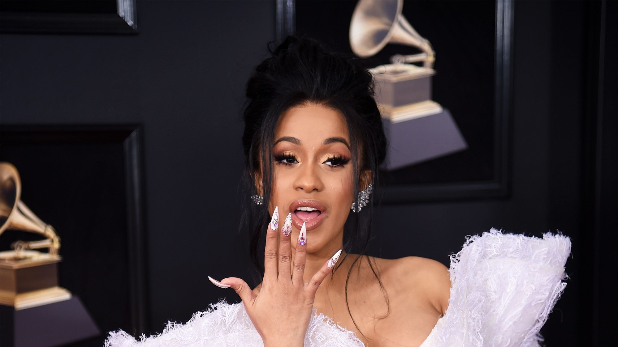 https://hips.hearstapps.com/hmg-prod/images/recording-artist-cardi-b-attends-the-60th-annual-grammy-news-photo-911547572-1560784475.jpg?crop=1xw:0.37444xh;center,top