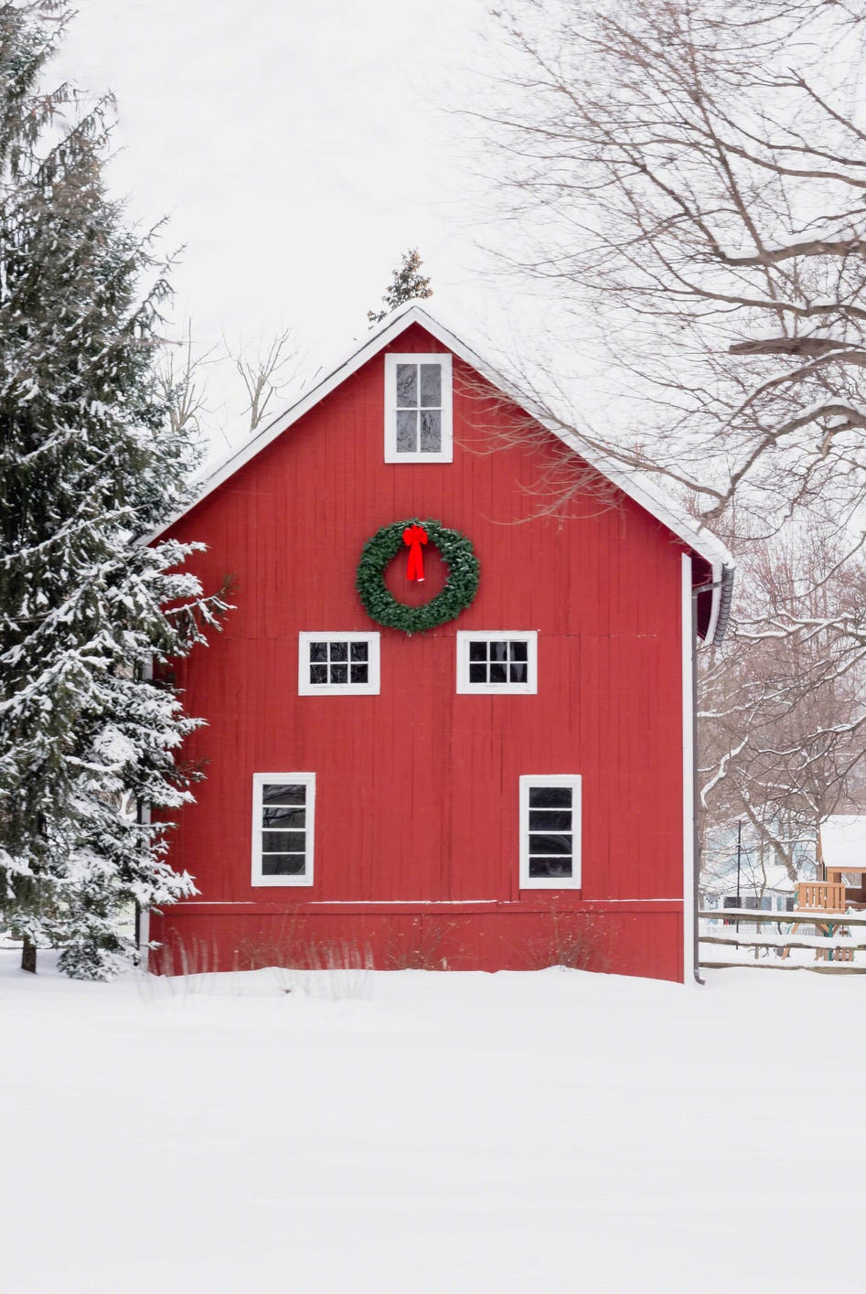 red barn in the snow rural winter scene