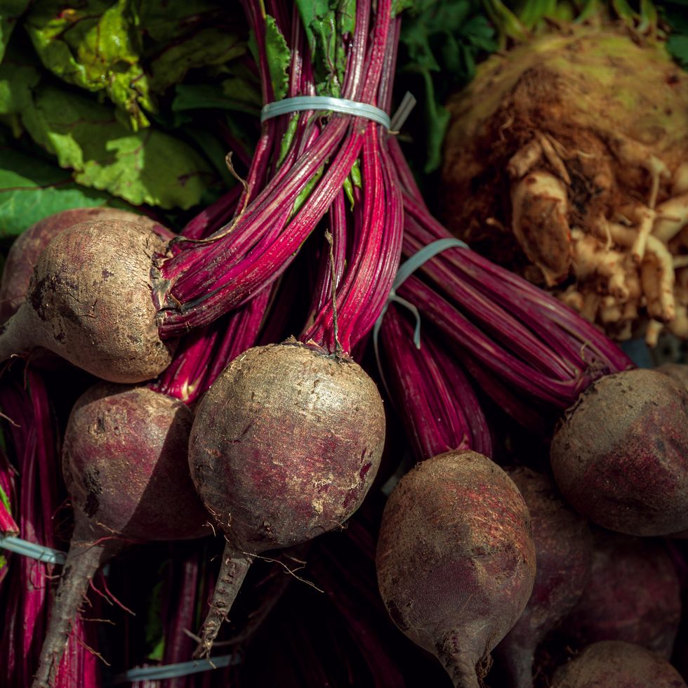 red beet roots with tops on farmer's market