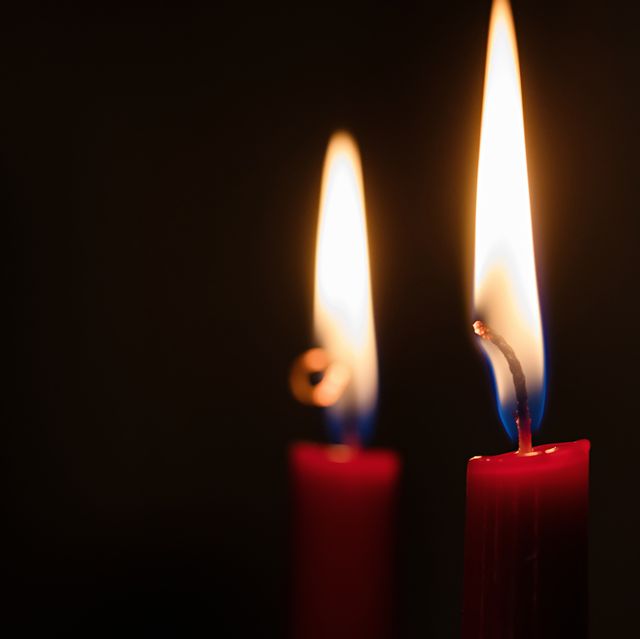 https://hips.hearstapps.com/hmg-prod/images/red-candles-aflame-royalty-free-image-1680620717.jpg?crop=0.668xw:1.00xh;0.270xw,0&resize=640:*