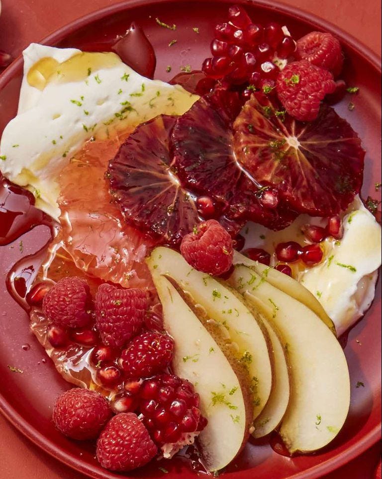 valentines day recipes red citrus salad with berries, pears and pomegranates