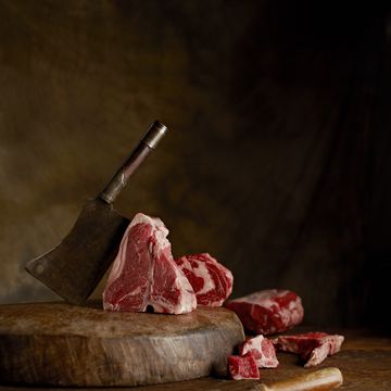 a knife cutting meat
