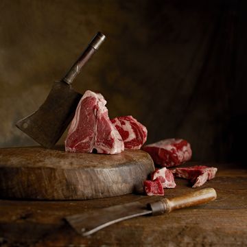 a knife cutting meat