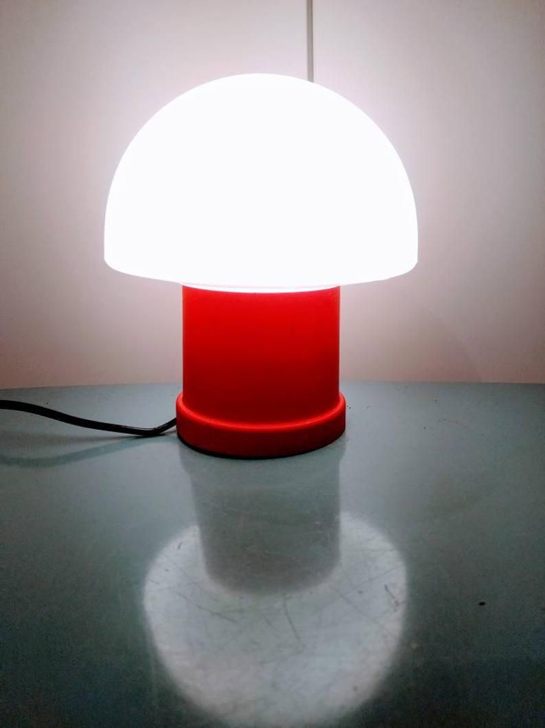red mushroom shaped table lamp