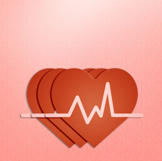 red paper heart and ekg