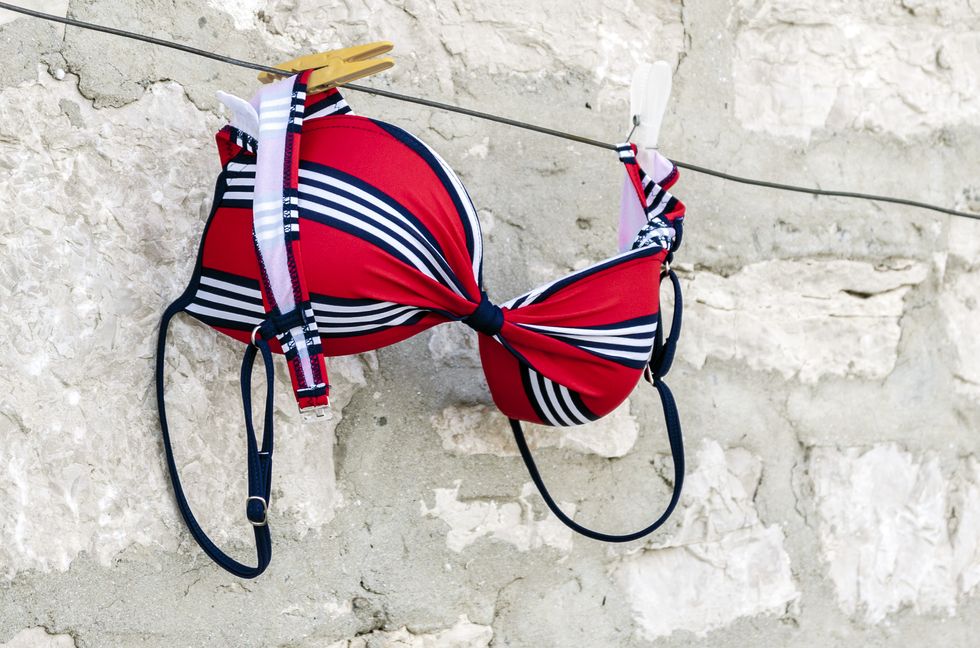 red swimsuit on clothesline