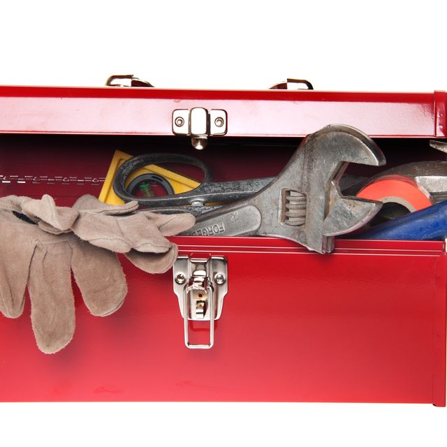 red tool box with variety of tools
