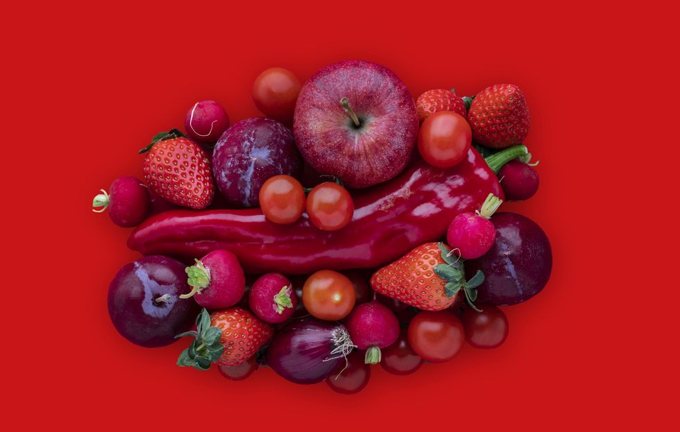 Red vegetables on red background