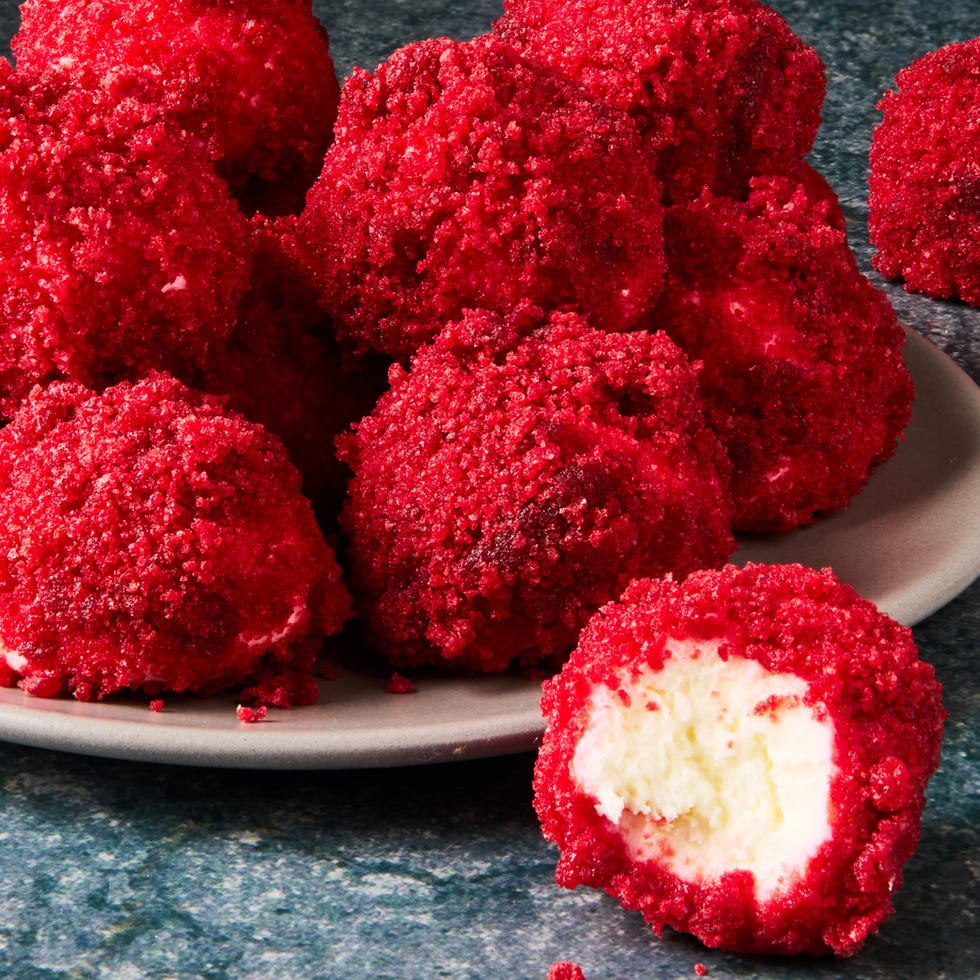 cheesecake bites rolled in red velvet cake pieces